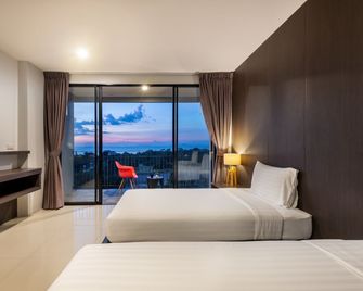 The Wind Hotel - Pattaya - Schlafzimmer