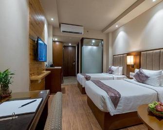 Hotel Cachar Club by Siara - Silchar - Bedroom