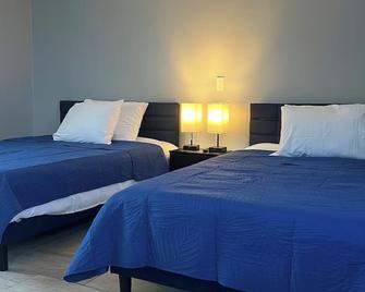 Nest Inn - Watertown - Schlafzimmer