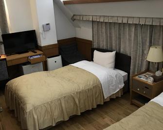 Business Hotel Crescent - טוקיו - חדר שינה