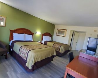 Big Spring Inn Madisonville - Madisonville - Slaapkamer