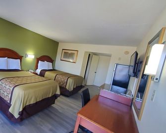 Big Spring Inn Madisonville - Madisonville - Slaapkamer