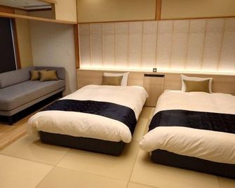 Tas Park Hotel - Nagai - Bedroom