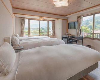Central Inn Hakuba - Hakuba - Bedroom