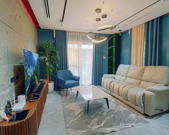 Executive 2-bedroom condo in Subic Bay Freeport Zone - Subic Bay Freeport Zone - Living room