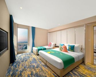 Wanda Holiday Hotel - Harbin - Bedroom