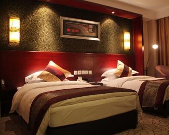 Dynasty International Hotel Yu - Kunming - Chambre