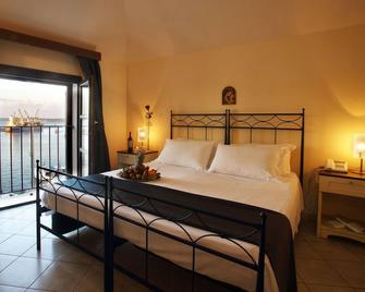 Al Pescatore Hotel & Restaurant - גאליפולי - חדר שינה