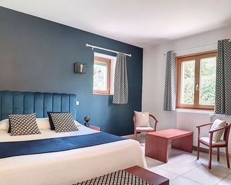 Hôtel Bon Encontre - סרלה לה-קאנדה - חדר שינה