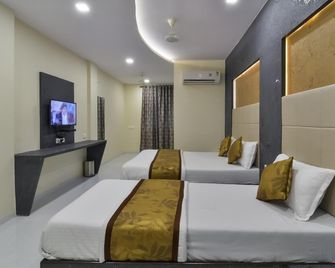 Hotel Aroma- Dadar - מומבאי - חדר שינה