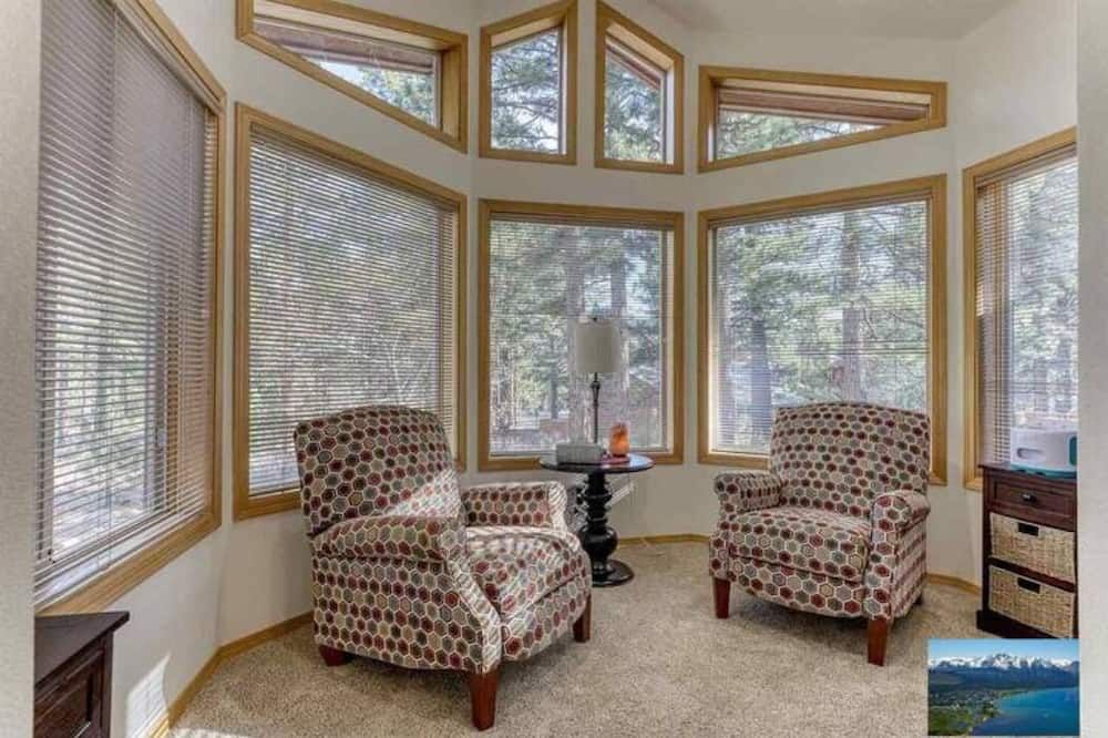 Living room view of 6000sf Pine House with indoor swimming pool