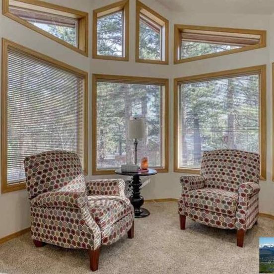 Living room view of 6000sf Pine House with indoor swimming pool
