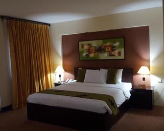 Grand Tembaga Hotel - Timika - Habitación