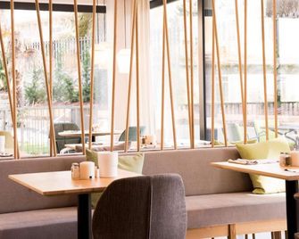 Flora Hotel & Suites - מראנו - מסעדה