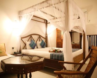 Oasey Beach Hotel - Bentota - Schlafzimmer