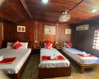 Villa Thavisouk Legend - Luang Prabang - לואנג פראבאנג - חדר שינה