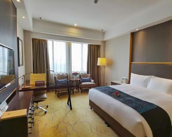 Junheng Hotel - Nanjing - Bedroom