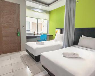 Legreen Suite Tondano - Jakarta - Schlafzimmer