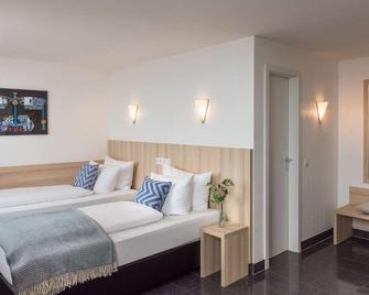 Hotel Conti Am Hauptbahnhof - מינסטר - חדר שינה