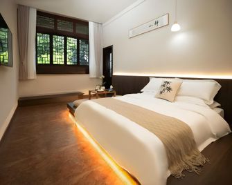 Zhoucun Jinxiang Leisure Vacation Zhuangyuan Mansion (Zibo Zhoucun Ancient Mall Store) - Zibo - Slaapkamer