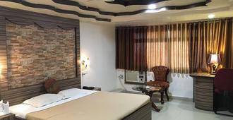 Hotel Grand Arjun - Raipur - Camera da letto