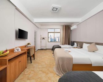 Haikou 9+1 Hotel (Meilan Airport) - Haikou - Habitación