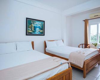 Chapi Hotel - Dong Hoi - Schlafzimmer