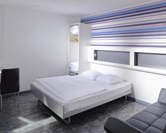 My Hotel Fribourg - Givisiez - Bedroom