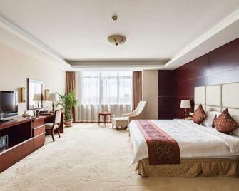 Seventh Fairy International Hotel - Anqing - Bedroom