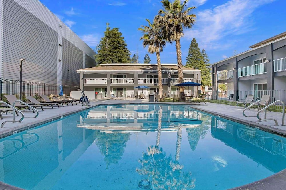 Pool view of SureStay Plus Hotel by Best Western Sacramento North