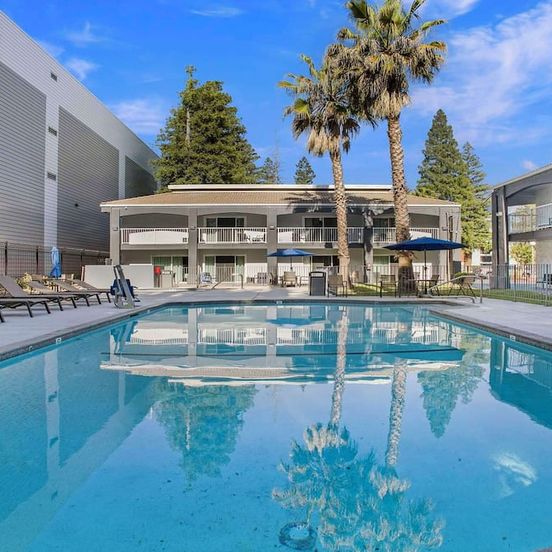 Pool view of SureStay Plus Hotel by Best Western Sacramento North