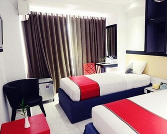 Hotel Prince Boulevard - Manado - Habitación