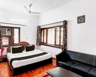 Collection O Krishna Nagar Chowk Near Ongc - New Tehri - Bedroom