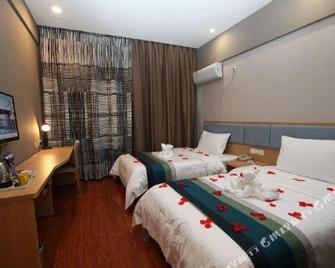 Home Pebble Motel (Mianyang Changhong international city) - Міан-Ян - Спальня