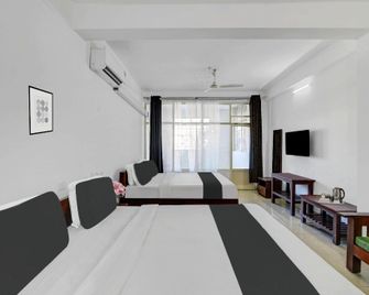 Super Collection O Madikeri City Center Near Ksrtc Bus Stand Coorg - Madikeri - Habitación