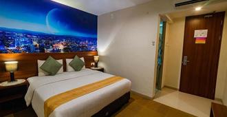 Miyana Hotel - Medan - Schlafzimmer