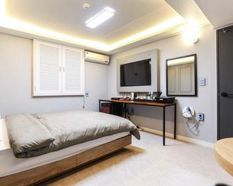Gangneung K Motel - Gangneung - Bedroom