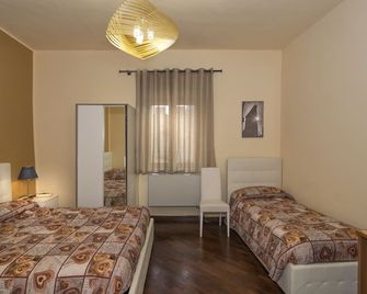 Hotel Il Giardino - Pisa - Camera da letto
