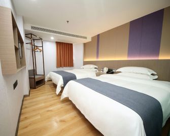 7 Days Inn Shenzhen Huaqiang Science Museum Subway Station - Shenzhen - Bedroom