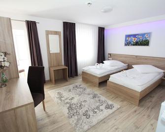 Pension Villa Colosseo im Herzen von Meiningen - Meiningen - Schlafzimmer