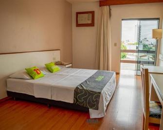 في أو إيه توتي بورورو بدجيت - روندونوبوليس - غرفة نوم