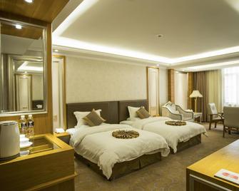 Rui Zhi Hotel - Qujing - Habitación