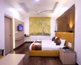 Hotel Krishna Sagar - Ghāziābād - Slaapkamer