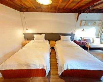 Lijiang Baisha Holiday Resort - Lijiang - Chambre