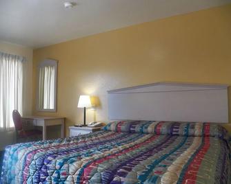 Sleepy Traveler Motel - Wagoner - Habitación