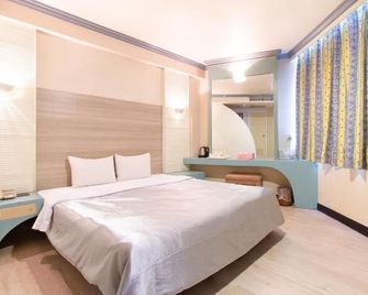 Hwa Nan Hotel - Tainan - Habitación