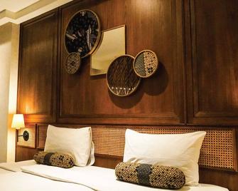 De Java Hotel - Bandung - Schlafzimmer