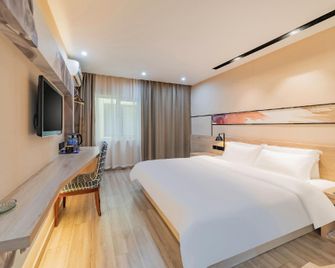 Rest Motel(Yancheng Tongma Store) - Yancheng - Bedroom