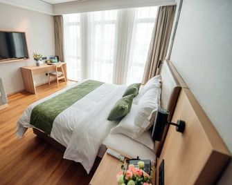 Greentree Inn Taizhou Xinghua City Zhouzhuang Town - Taizhou - Bedroom