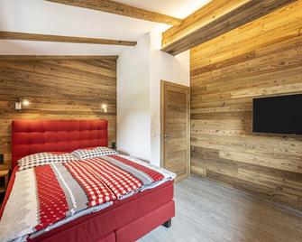 Premium chalet with sauna next to the ski slope - Forstau - Habitación